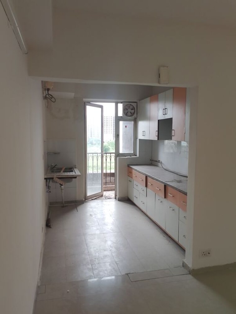 Kitchen, dlf-new-town-heights-town-houses 3.5 Bedroom 1895 Sq.Ft. Apartment In Sector 86 Gurgaon 10669794