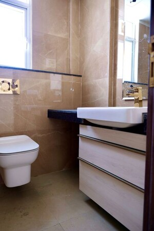 Bathroom in 3.5 BHK Apartment at Smart World Orchard, Sector 61 – for Rent