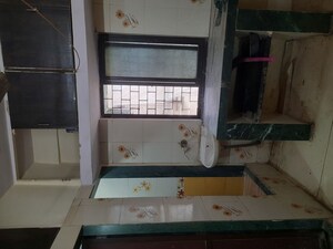 Kitchen in 1 RK Apartment at Om Jagmata CHS, Uthalsar – for Rent