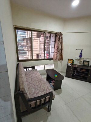 Living Room in 1 BHK Apartment at Avillion Greenfields Co Op Housing Society, Jogeshwari East – for Rent
