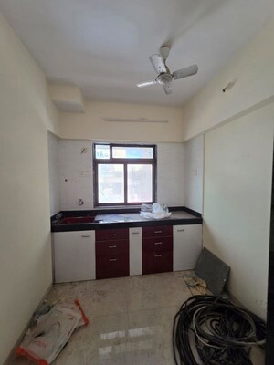 Kitchen in 1 BHK Apartment at Avillion Greenfields Co Op Housing Society, Jogeshwari East – for Rent