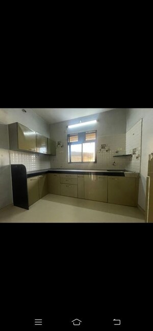 Kitchen in 2 BHK Apartment at Ojass Mayuresh CHS, Naupada – for Rent