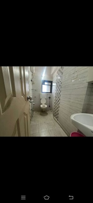 Bathroom in 2 BHK Apartment at Ojass Mayuresh CHS, Naupada – for Rent