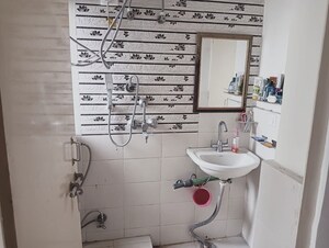 Bathroom in 2 BHK Apartment at Conscient Habitat 78, Sector 78 – for Rent