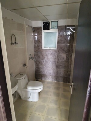 Bathroom in 2 BHK Apartment at Mittal Rajnagar Residency, Raj Nagar Extension – for Rent