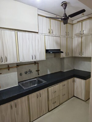 Kitchen in 3 BHK Apartment at Mittal Rajnagar Residency, Raj Nagar Extension – for Rent