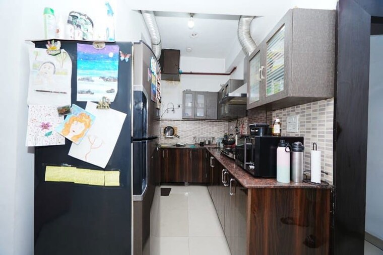 Kitchen, crossing-republik 2.5 Bedroom 1320 Sq.Ft. Apartment In Crossing Republic Ghaziabad 10670063