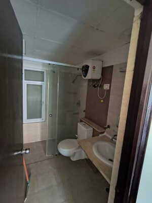 Bathroom in 3 BHK Apartment at Mahagun Moderne, Sector 78 – for Sale