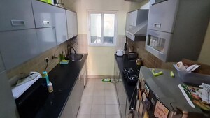 Kitchen in 3 BHK Apartment at Mahagun Moderne, Sector 78 – for Sale