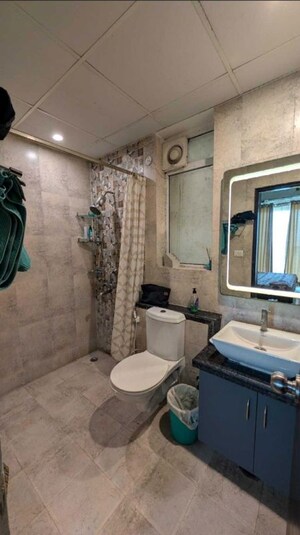 Bathroom in 3 BHK Apartment at Mahagun Mirabella, Sector 79 – for Rent