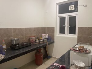 Kitchen in 2 BHK Apartment at Omaxe Hazratganj Residency, Gomti Nagar – for Rent