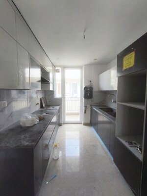 Kitchen in 3.5 BHK Apartment at Panchsheel Enclave – for Sale