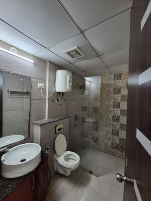 Bathroom in 3 BHK Apartment at Gaur Sportswood, Sector 79 – for Rent