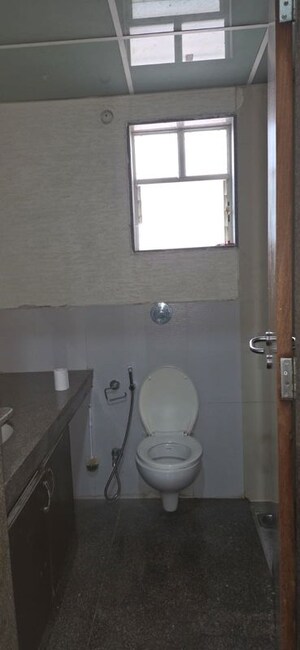Bathroom in 3 BHK Apartment at Kumar Peninsula, Baner – for Rent