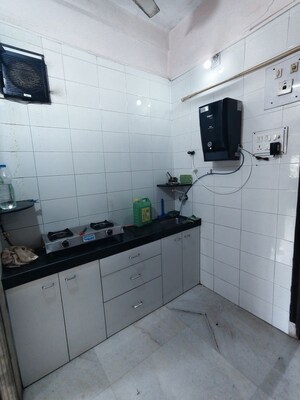 Kitchen in 1 BHK Apartment at Tulsi Bhavan Apartment, Sion West – for Rent