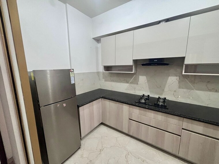 Kitchen, smart-world-orchard 3 Bedroom 1630 Sq.Ft. Apartment In Sector 61 Gurgaon 10670426