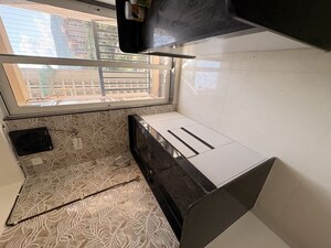 Kitchen in 1 BHK Apartment at Raunak Residency Thane, Pokhran Road No One – for Rent