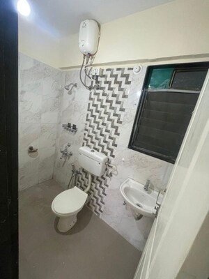 Bathroom in 2 BHK Apartment at Hubtown Greenwoods, Vartak Nagar – for Rent