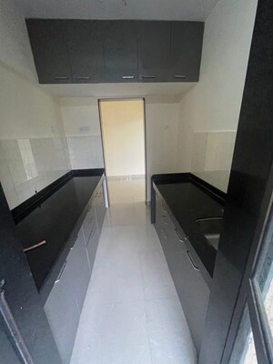 Kitchen in 2 BHK Apartment at Hubtown Greenwoods, Vartak Nagar – for Rent
