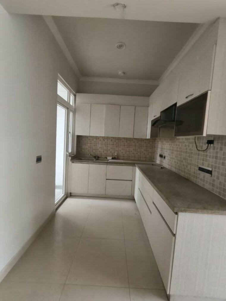 Kitchen, central-park-flower-valley 2.5 Bedroom 1100 Sq.Ft. Apartment In Sohna Sector 33 Gurgaon 10670613