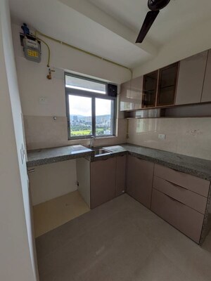 Kitchen in 1 BHK Apartment at Piramal Vaikunth Cluster 2, Balkum Pada – for Rent