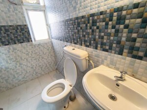 Bathroom in 2 BHK Apartment at Signature Global Orchard Avenue, Sector 93 – for Sale