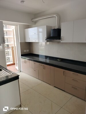 Kitchen in 4 BHK Apartment at Rishita Manhattan, Gomti Nagar – for Rent