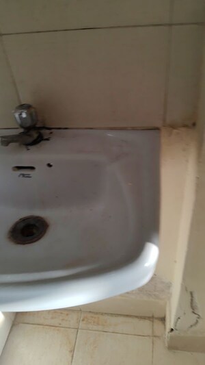 Bathroom in 1 BHK Apartment at Swadesi Mill Apartment, Chunabhatti – for Rent