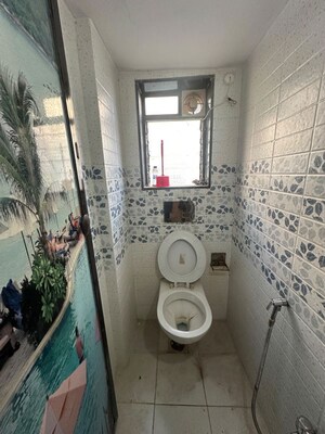 Bathroom in 1 BHK Apartment at Rose Garden CHS, Borivali West – for Rent