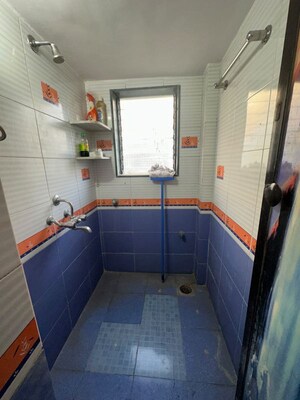 Bathroom in 1 BHK Apartment at Rose Garden CHS, Borivali West – for Rent