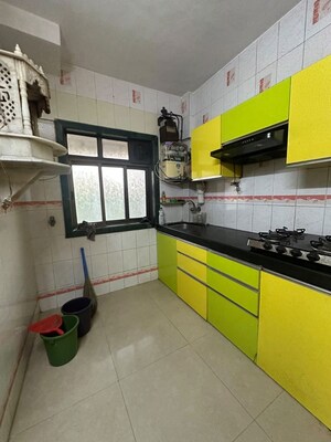 Kitchen in 1 BHK Apartment at Rose Garden CHS, Borivali West – for Rent