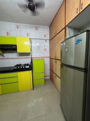 Kitchen in 1 BHK Apartment at Rose Garden CHS, Borivali West – for Rent