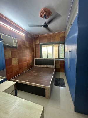 Bedroom in 1 BHK Apartment at Rose Garden CHS, Borivali West – for Rent