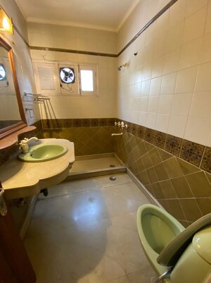 Washroom in 3 BHK Builder Floor at Greater Kailash I – for Rent