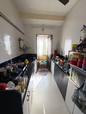 Kitchen in 1 BHK Apartment at Mhatre Royal CHS, Dahisar West – for Sale