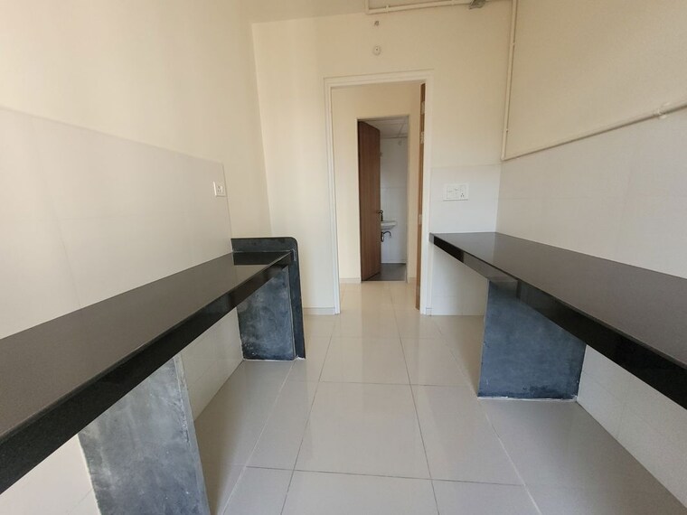 Kitchen, godrej-emerald 2 Bedroom 708 Sq.Ft. Apartment In Ghodbunder Road Thane 10670835