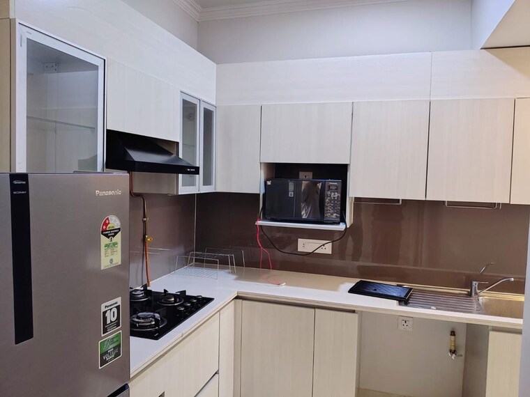 Kitchen, central-park-cerise-suites 2.5 Bedroom 1230 Sq.Ft. Builder Floor In Sohna Sector 33 Gurgaon 10670856