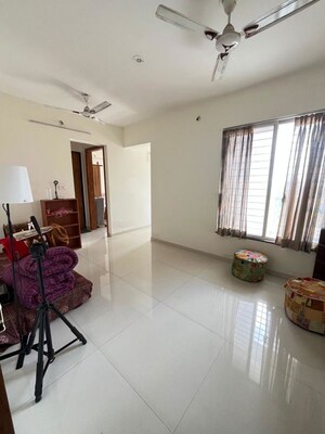 Living Room in 1 BHK Apartment at Vision Indramegh, Tathawade – for Rent