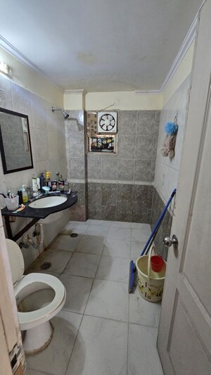 Washroom in 2 BHK Apartment at Niho Jasmine Scottish Garden, Ahinsa Khand 2 – for Rent