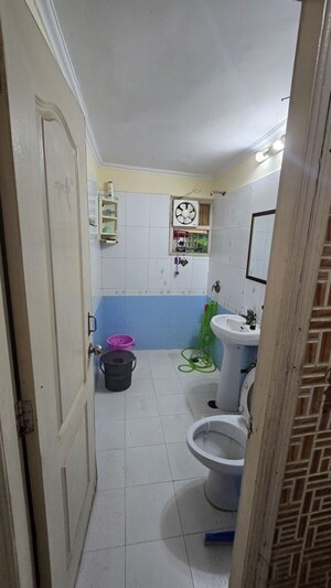 Bathroom in 2 BHK Apartment at Niho Jasmine Scottish Garden, Ahinsa Khand 2 – for Rent