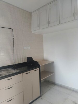 Kitchen in 2 BHK Apartment at Varun Garden, Ghodbunder Road – for Rent