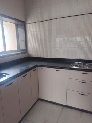 Kitchen in 2 BHK Apartment at Varun Garden, Ghodbunder Road – for Rent