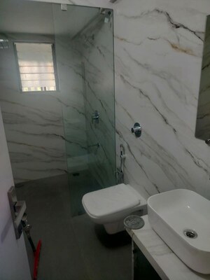 Bathroom in 2 BHK Apartment at Varun Garden, Ghodbunder Road – for Rent