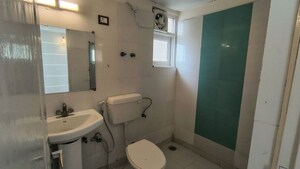 Bathroom in 2 BHK Apartment at High End Paradise II, Raj Nagar Extension – for Sale