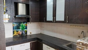 Kitchen in 2 BHK Apartment at High End Paradise II, Raj Nagar Extension – for Sale