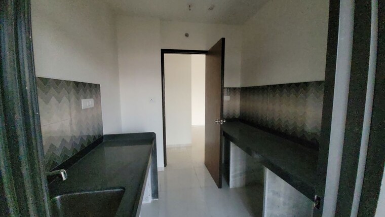 Kitchen, lodha-splendora 2 Bedroom 643 Sq.Ft. Apartment In Ghodbunder Road Thane 10670951