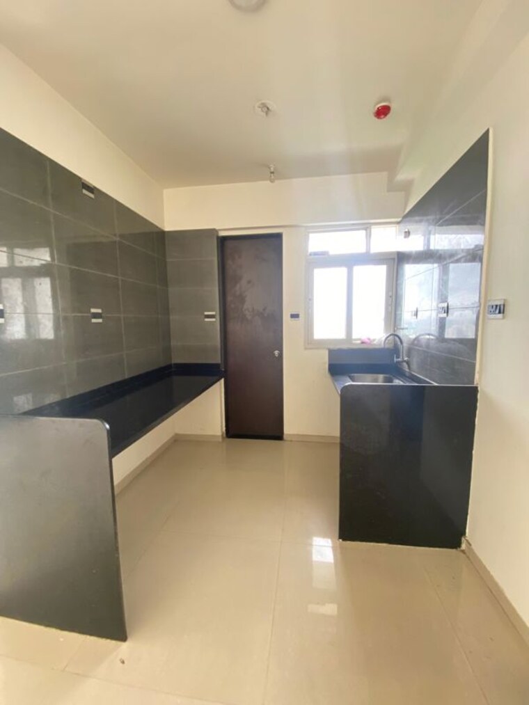 Kitchen, pharande-puneville 2 Bedroom 728 Sq.Ft. Apartment In Punawale Pune 10670953