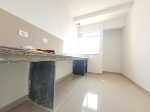 Kitchen in 2 BHK Apartment at Puranik City Reserva, Ghodbunder Road – for Rent