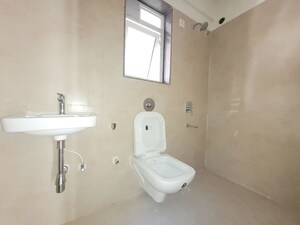 Bathroom in 2 BHK Apartment at Puranik City Reserva, Ghodbunder Road – for Rent