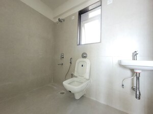 Bathroom in 2 BHK Apartment at Puranik City Reserva, Ghodbunder Road – for Rent